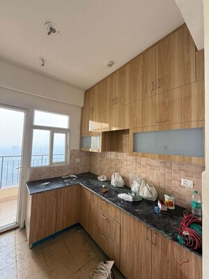 Kitchen in 3 BHK Apartment at Amrapali Crystal Homes, Sector 76 – for Rent