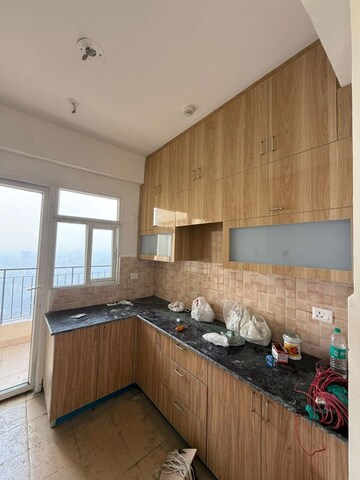 Kitchen in 3 BHK Apartment at Amrapali Crystal Homes, Sector 76 – for Rent