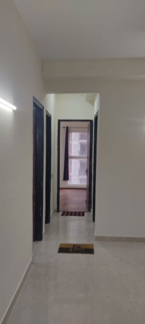 Building Lobby in 3 BHK Apartment at Amrapali Crystal Homes, Sector 76 – for Rent
