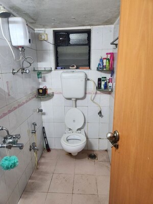 Bathroom in 1 BHK Apartment at Bullion House, Bhuleshwar – for Rent