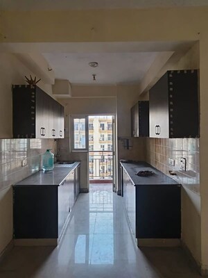 Kitchen in 2 BHK Apartment at Gardenia Golf City, Sector 75 – for Rent