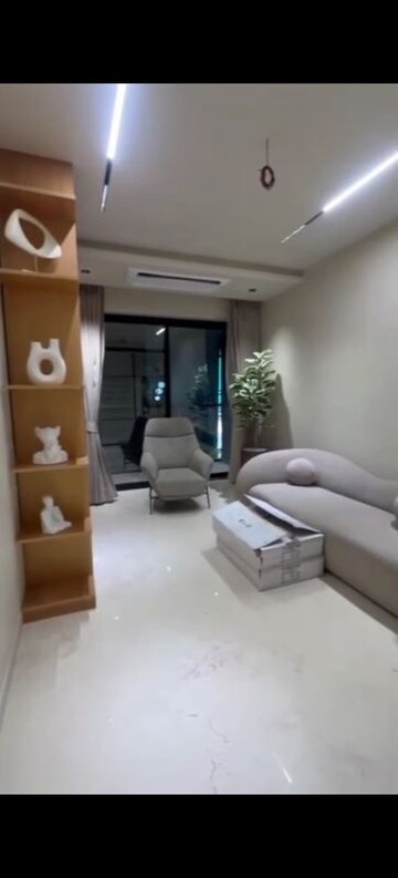 Living Room in 4 BHK Apartment at Dev Leo Tower, Oshiwara – for Rent