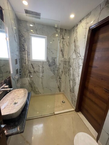 Bathroom in 4 BHK Apartment at DLF Atria, Dlf Phase ii – for Sale