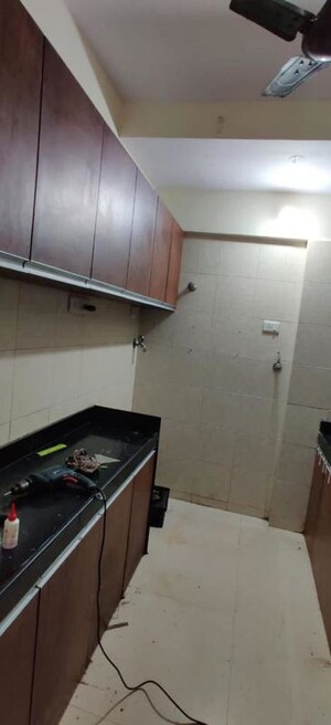Kitchen in 2 BHK Apartment at Bombay Taximens CHS, Lbs Marg – for Rent