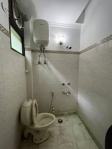 Bathroom in 4 BHK Builder Floor at Nehru Enclave – for Rent