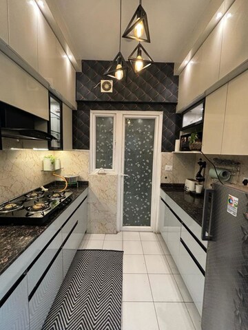 Kitchen in 2.5 BHK Apartment at Elite Golf Green, Sector 79 – for Rent