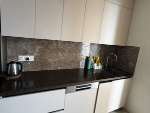 Kitchen in 3.5 BHK Apartment at Elite Golf Green, Sector 79 – for Rent