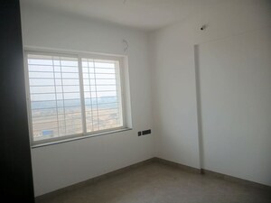 Room in 2 BHK Apartment at Skyrise Sparkle, Dhanori – for Rent