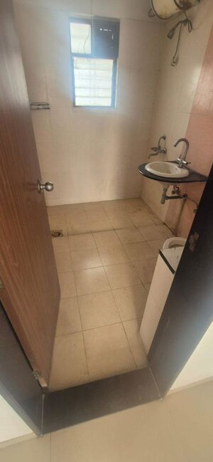 Bathroom in 2 BHK Apartment at Rosewood Apartment, Undri – for Rent