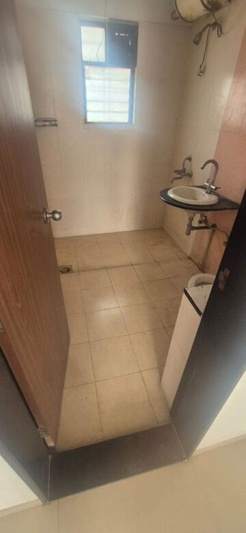 Bathroom in 2 BHK Apartment at Rosewood Apartment, Undri – for Rent