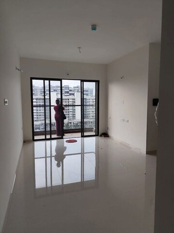 Living Room in 2 BHK Apartment at Kumar Palmspring Towers, Undri – for Rent