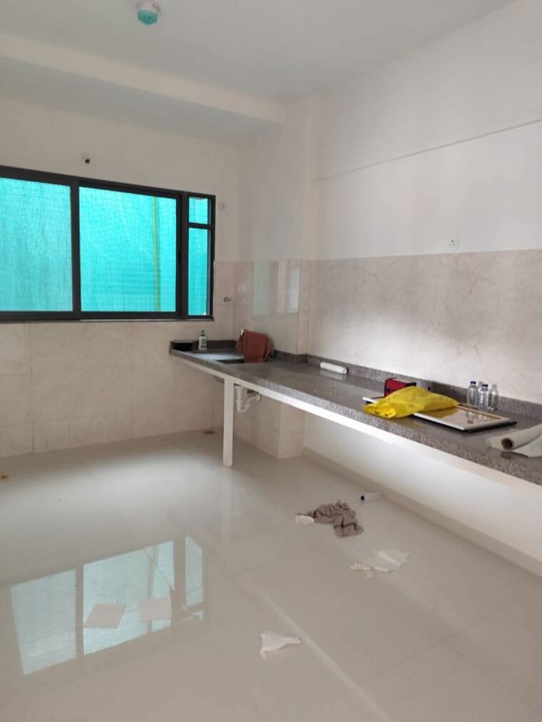 Kitchen, kumar-palmspring-towers 2 Bedroom 834 Sq.Ft. Apartment In Undri Pune 9948488