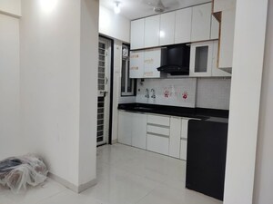 Kitchen in 2 BHK Apartment at Basil Mondale, Mundhwa – for Rent