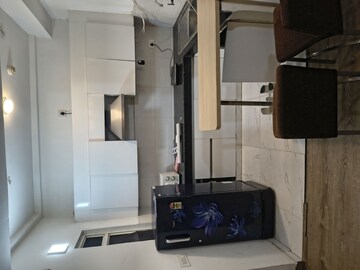 Kitchen in Studio Apartment at Nimbus The Golden Palm, Sector 168 – for Rent