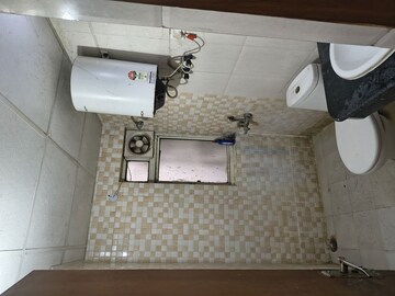 Bathroom in 2.5 BHK Apartment at Nimbus The Golden Palm, Sector 168 – for Rent