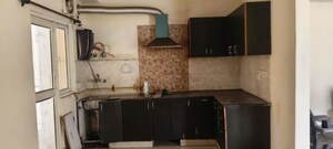 Kitchen in 2 BHK Apartment at Gardenia Golf City, Sector 75 – for Rent