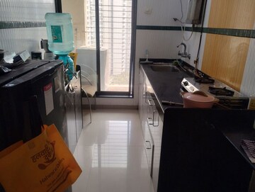 Kitchen in 2 BHK Apartment at Dedhia Palatial Height, Powai – for Rent
