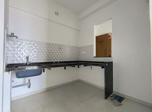 Kitchen in 2 BHK Apartment at Godrej Boulevard, Manjari – for Rent