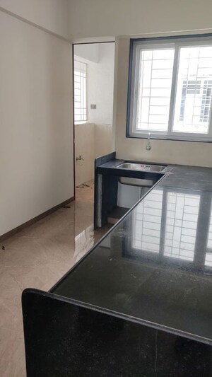 Kitchen in 2 BHK Apartment at Rambaug Colony – for Sale