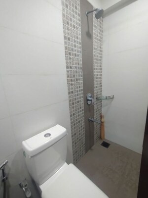 Bathroom in 3 BHK Apartment at Ambrosial Kesarban, Santacruz East – for Rent