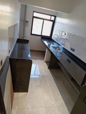 Kitchen in 3 BHK Apartment at Ravima Newton Homes, Hadapsar – for Sale