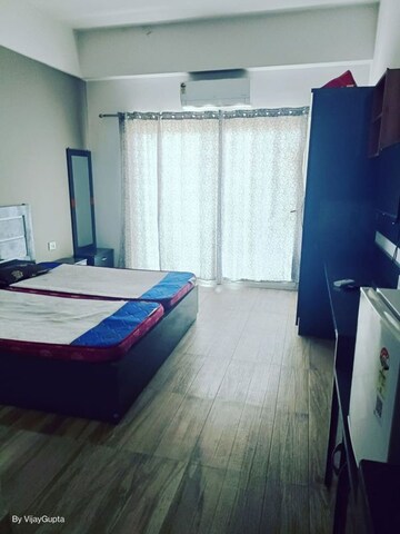 Bedroom in 1 BHK Apartment at Paramount Golfforeste, Zeta I Greater Noida – for Rent