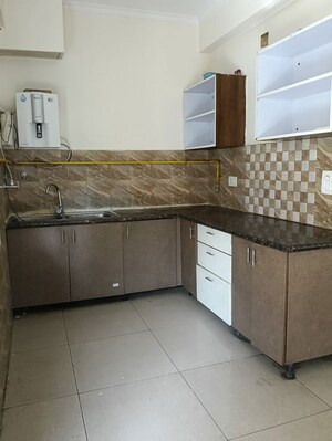 Kitchen in 2 BHK Apartment at Gaurs Cascades, Raj Nagar Extension – for Sale