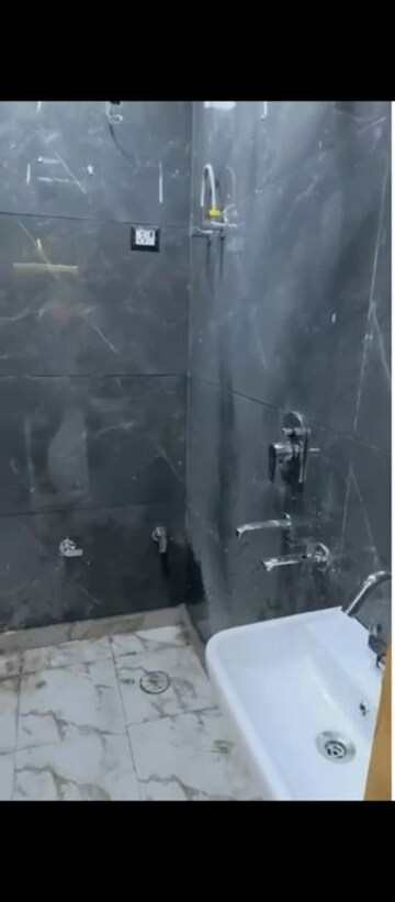 Bathroom in 2 BHK Builder Floor at Dwarka Mor – for Sale