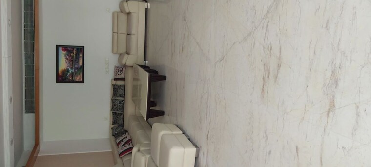 Living Room, jaypee-green-sun-court-tower-iii 3 Bedroom 3800 Sq.Ft. Apartment In Jaypee Greens Greater Noida 9963569