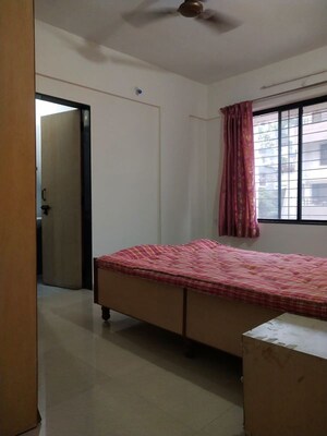Bedroom in 3 BHK Apartment at Nisarg Akash, Pimple Nilakh – for Rent