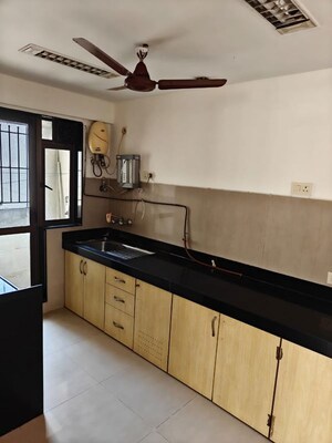 Kitchen in 2.5 BHK Apartment at Raheja Acropolis, Deonar – for Rent