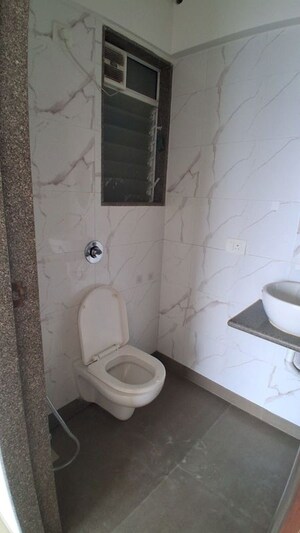 Attached Bathroom in 1 BHK Apartment at Starwing Kaatyayni Heights, Andheri East – for Rent