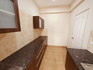 Kitchen in 2.5 BHK Apartment at Ashiana Mulberry, Sohna Sector 2 – for Sale