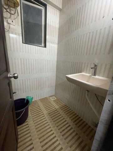 Bathroom in 1 BHK Apartment at Fairmont Palazo, Santacruz East – for Sale