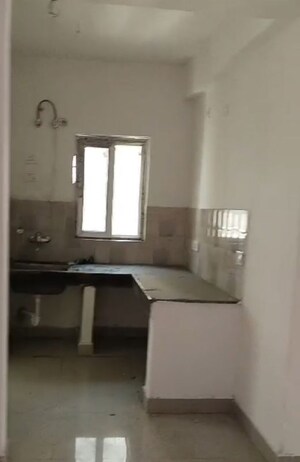 Kitchen in 2 BHK Apartment at Omicron Iii Greater Noida – for Sale