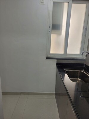 Kitchen in 2 BHK Apartment at Pawar Riseonic, Mundhwa – for Sale