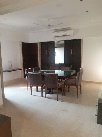 Living Room in 4 BHK Apartment at Juhu Scheme, Juhu – for Rent