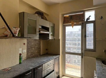 Kitchen in 2 BHK Apartment at Prateek Wisteria, Sector 77 – for Sale