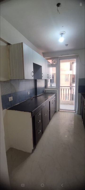 Kitchen in 2.5 BHK Apartment at Sikka Karmic Greens, Sector 78 – for Rent