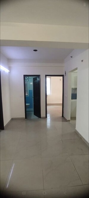 Building Lobby in 2.5 BHK Apartment at Sikka Karmic Greens, Sector 78 – for Rent