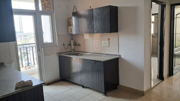 Kitchen in 3 BHK Apartment at Amrapali Princely Estate, Sector 76 – for Sale