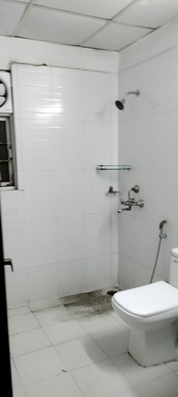 Bathroom in 2 BHK Apartment at Aims Golf Avenue II, Sector 75 – for Rent