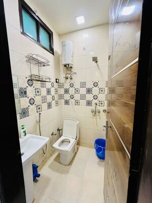 Bathroom in 3 BHK Builder Floor at Dwarka Mor – for Rent