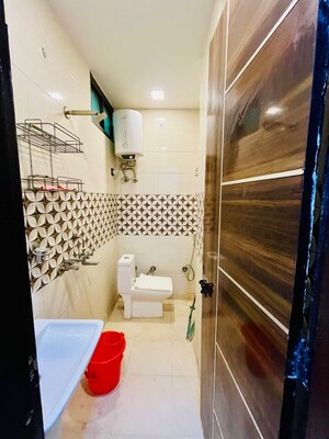 Bathroom in 3 BHK Builder Floor at Dwarka Mor – for Rent