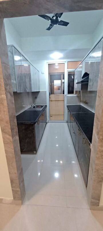Kitchen in 2 BHK Apartment at ABA Cleo County, Sector 121 – for Sale