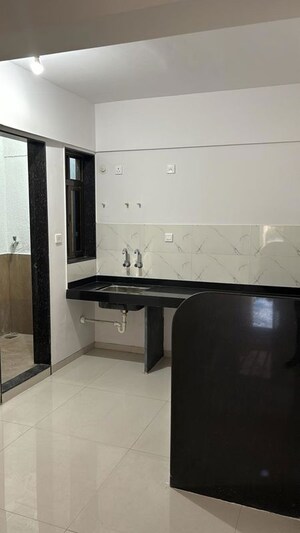 Kitchen in 2 BHK Apartment at Bhaktamar Residency, Wadgaon Sheri – for Sale