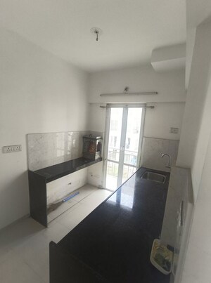 Kitchen in 2 BHK Apartment at Godrej Vihaa, Badlapur East – for Rent