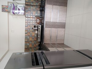Kitchen in 2 BHK Apartment at Abhinav Pebbles Urbania, Bavdhan – for Rent