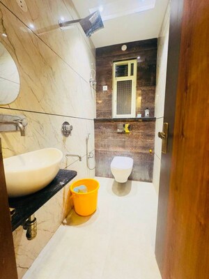 Bathroom in 3 BHK Builder Floor at Dwarka Mor – for Rent