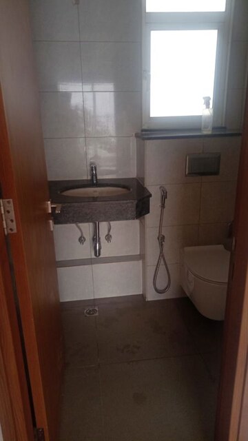 Bathroom in 2 BHK Apartment at Godrej Woods, Sector 43 – for Sale